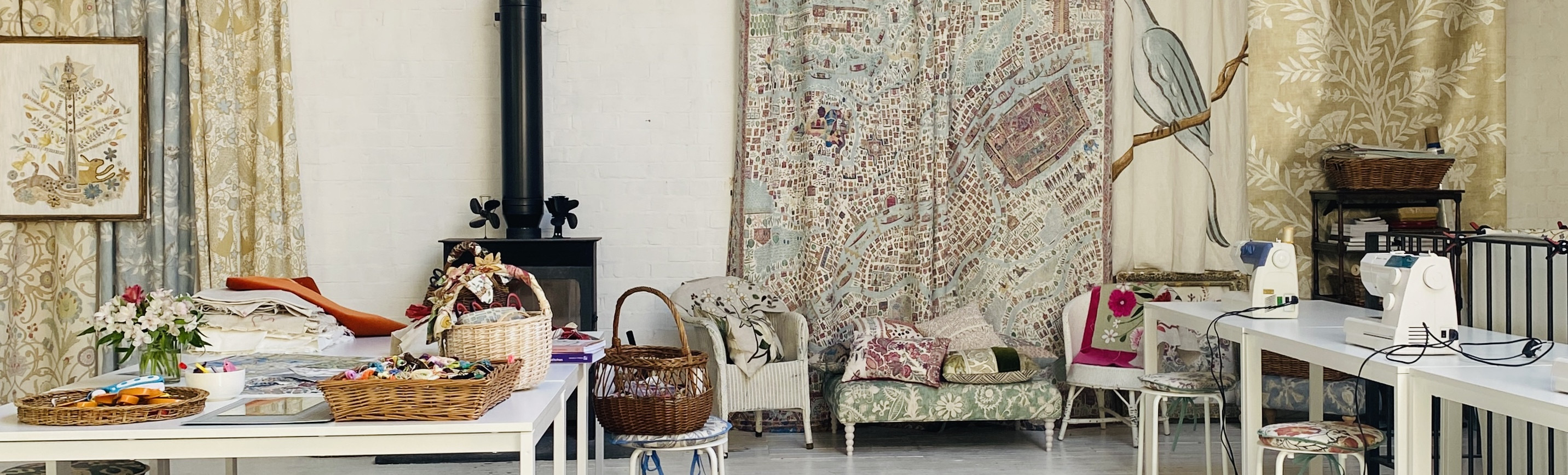 <p>Visitors exploring fabrics and interiors at Top Floor Woodchester</p>
